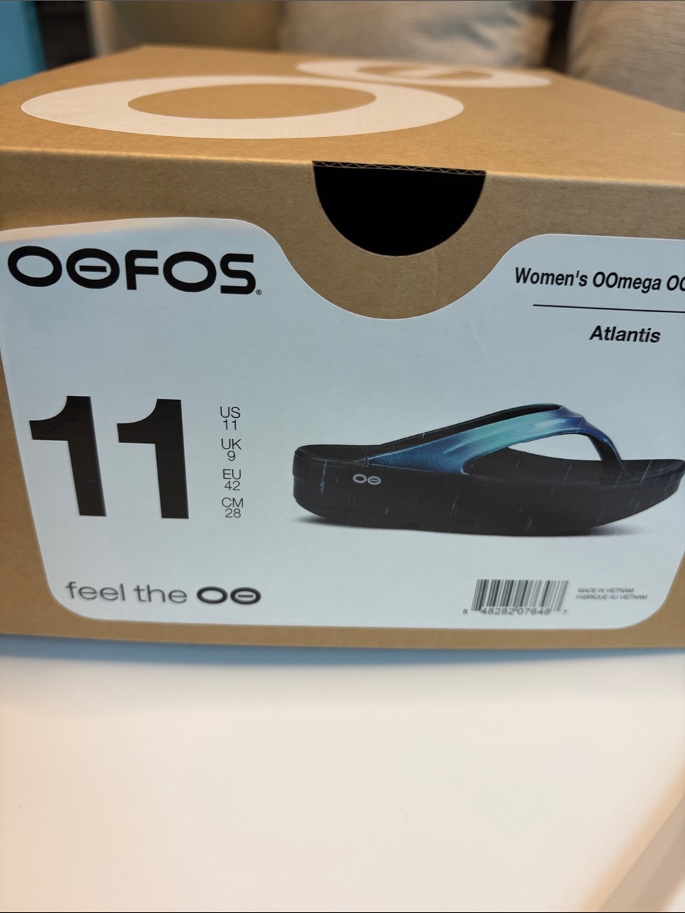 OOFOS Women's OOmassage Flip Sandal - Atlantis Blue with Black Sole